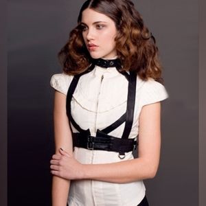 Skingraft leatger set of harness halter and garter belt.